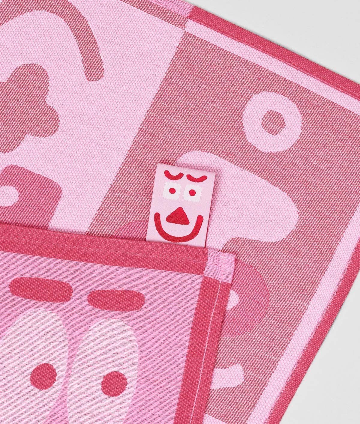 Making Faces Pink/Maroon Woven Cotton Tea Towel